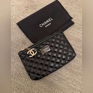 CHANEL Black Quilted Cosmetic Pouch with Gold CC Charm